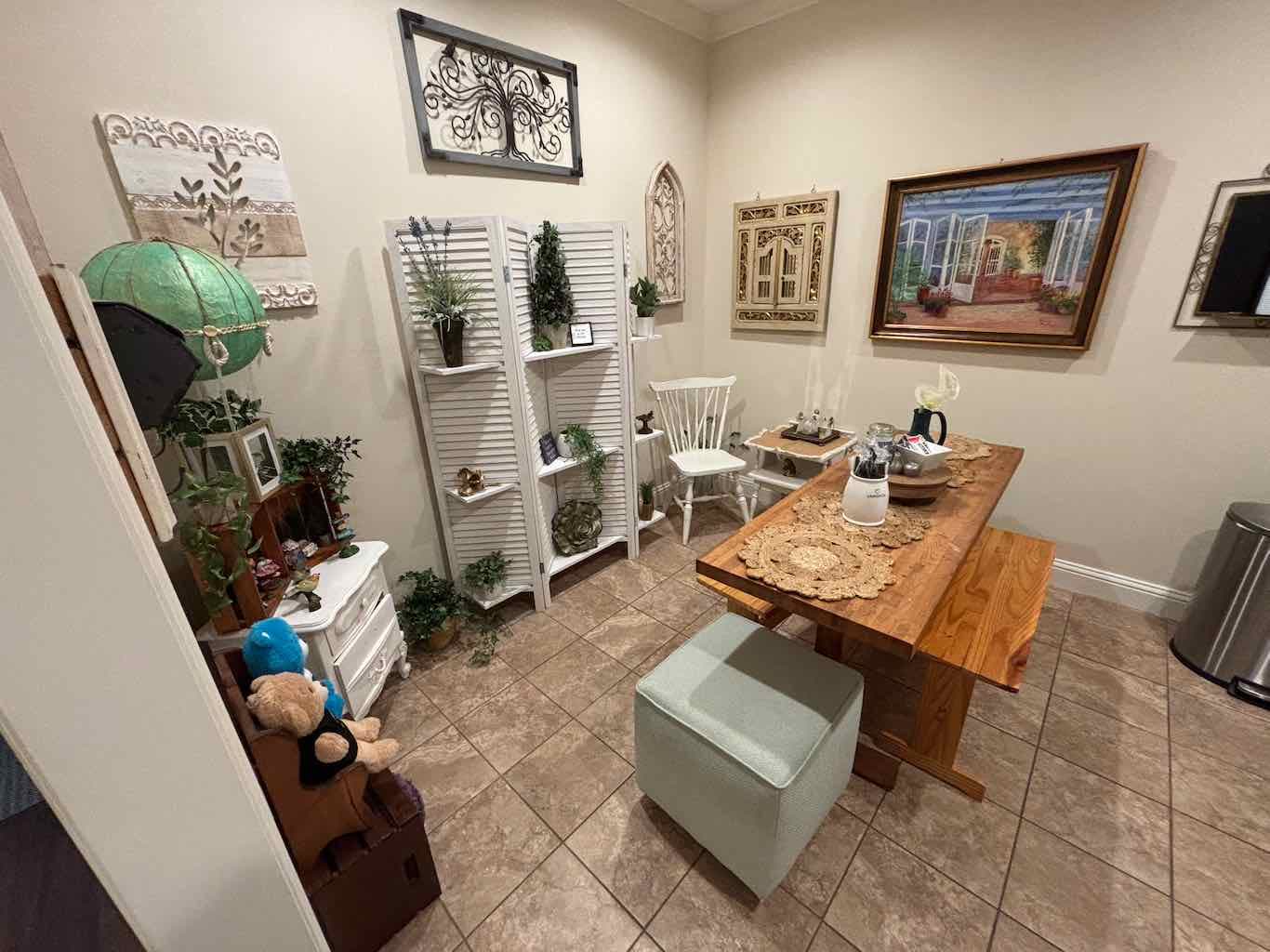 Shared kitchen and lounge with warm decor and dining area